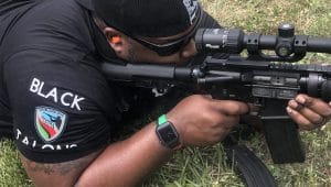 A National African-American Gun Association member shoots an AR-15