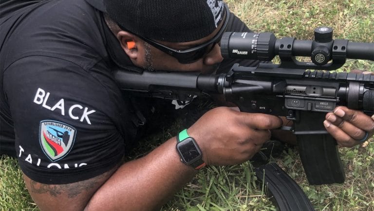 A National African-American Gun Association member shoots an AR-15