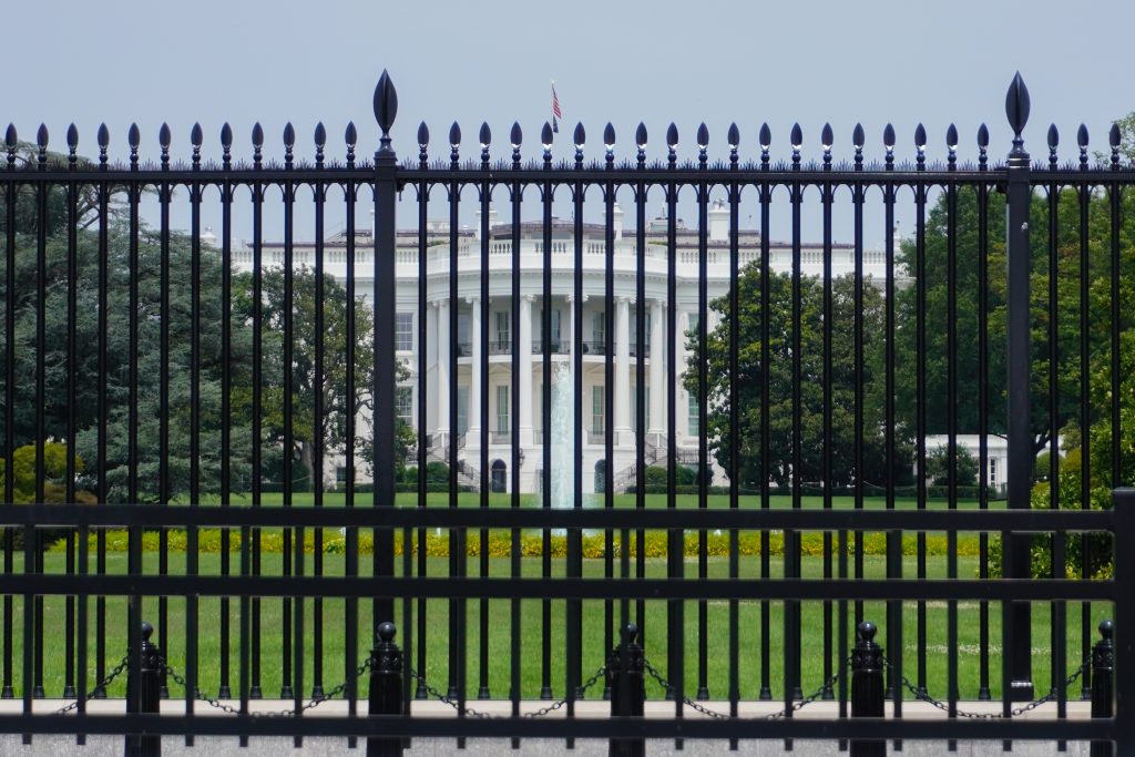 The White House set behind its security fence