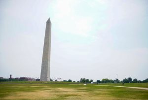 Tourists visit the Washington Monument in Washington, D.C.