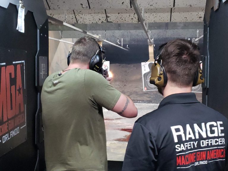 A customer shoots at a gun range