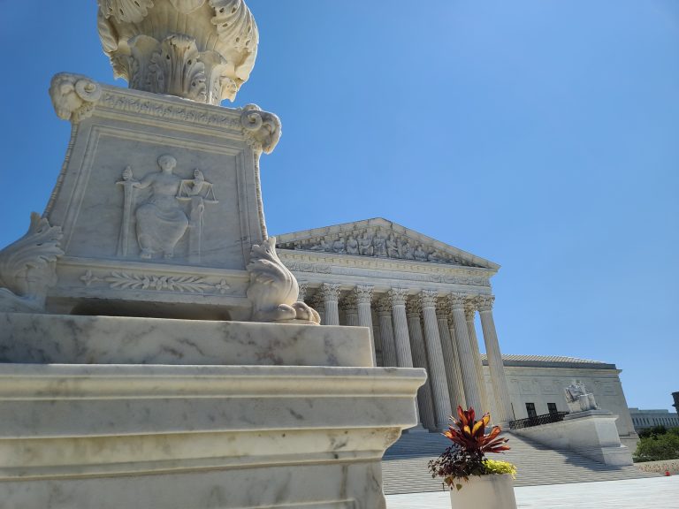 A depiction of Lady Justice outside the Supreme Court