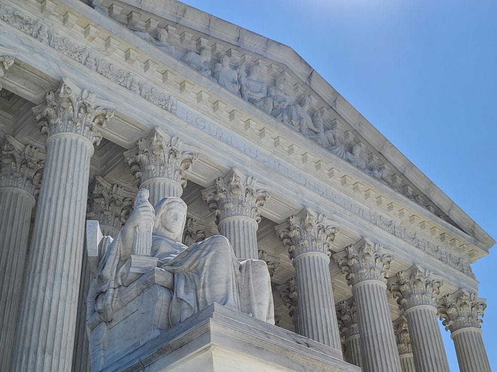 The Contemplation of Justice statue sits in front of the Supreme Court