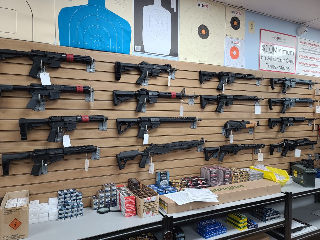 AR-15 and other rifles on display at a gun store