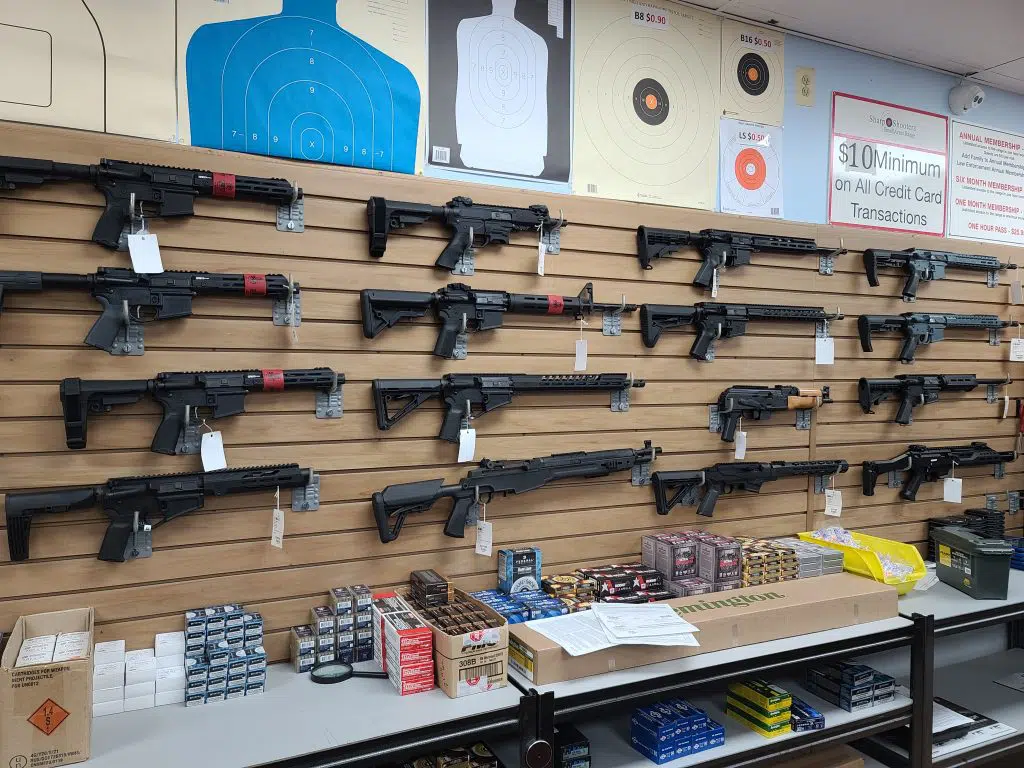 AR-15s and other rifles on display at a gun store