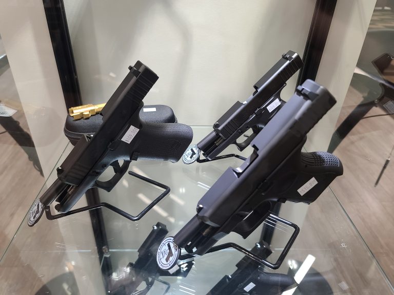 Pistols on display at a gun store