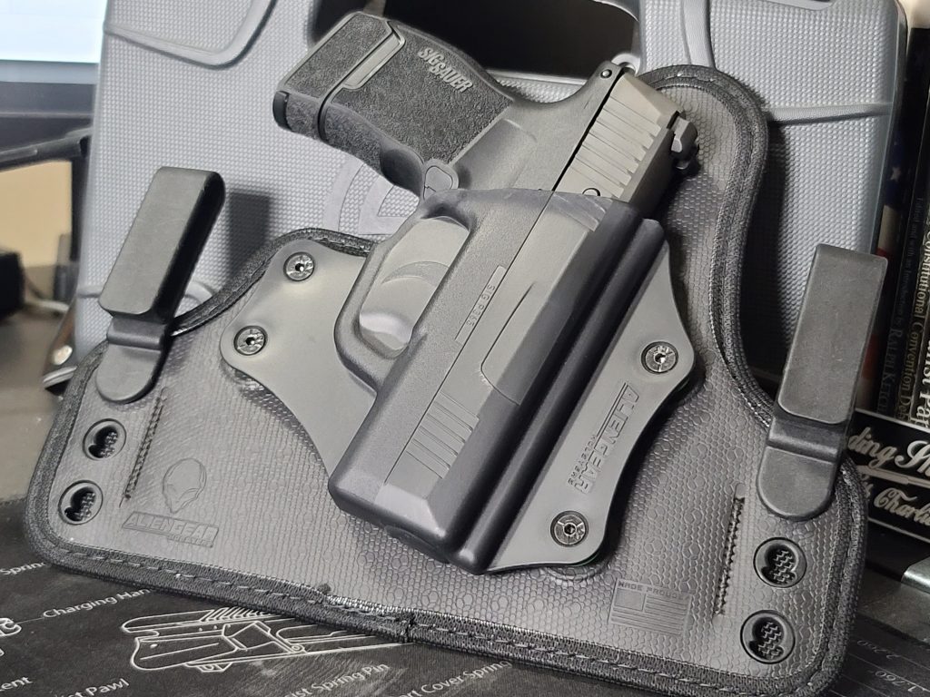 A Sig Sauer P365 in an inside the waistband holster