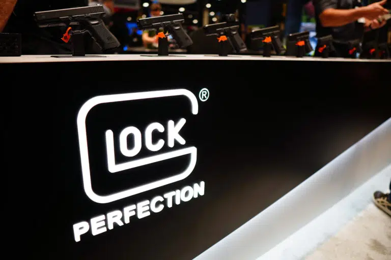 The Glock booth displays the company's different handguns at SHOT Show 2022