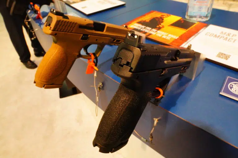 A pair of Smith & Wesson handguns on display at SHOT Show 2022