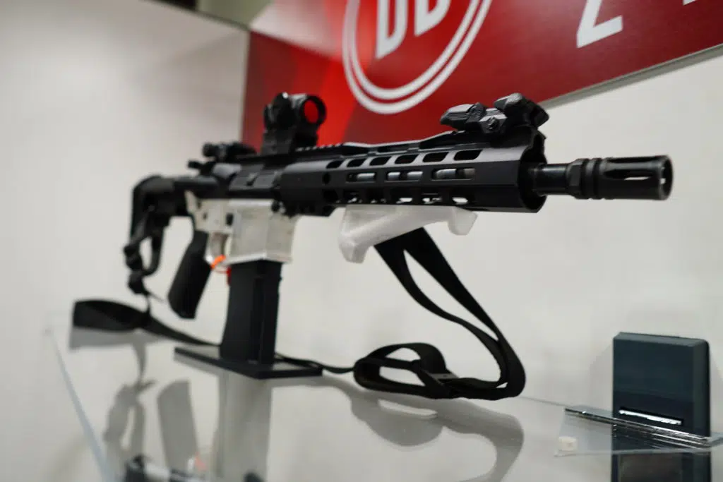 An AR-15 built with an unserialized lower receiver made by Defense Distributed on display at SHOT Show 2022