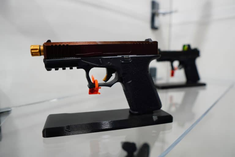 An unserialized pistol, or "ghost gun," on display at SHOT Show 2022