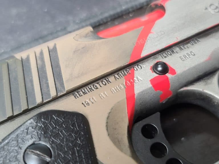 Remington Arms Company's roll marks on a 1911 pistol