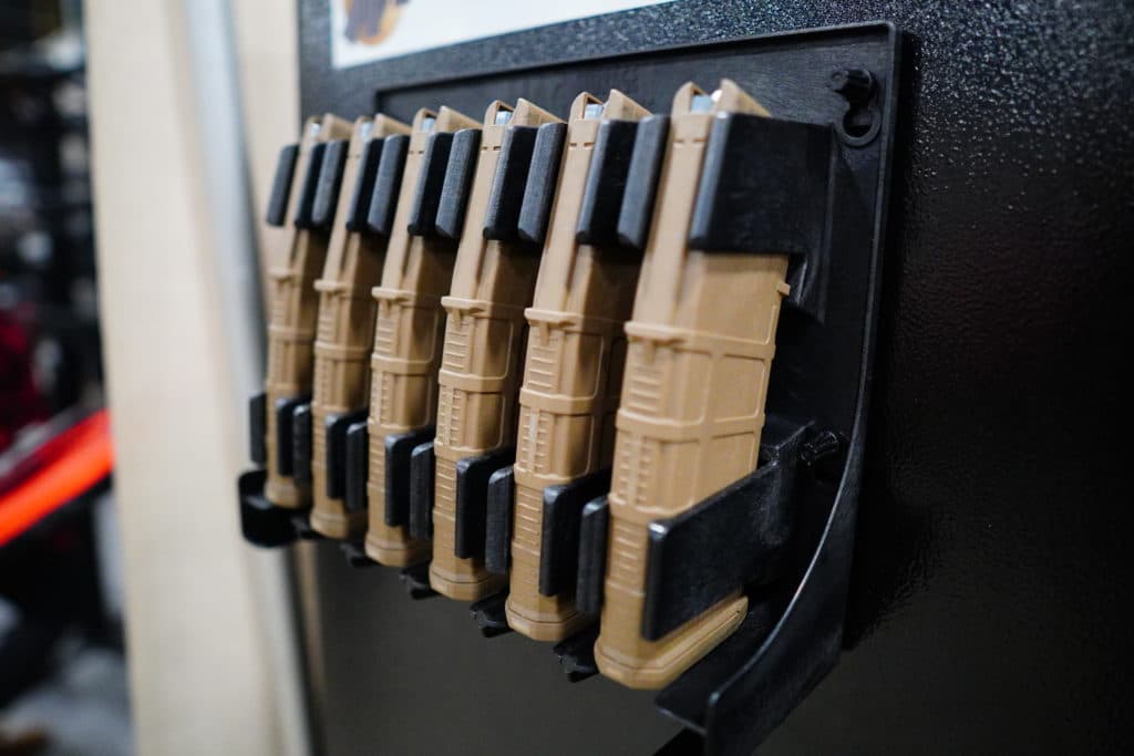 A rack of 30-round magazines on display at a trade show