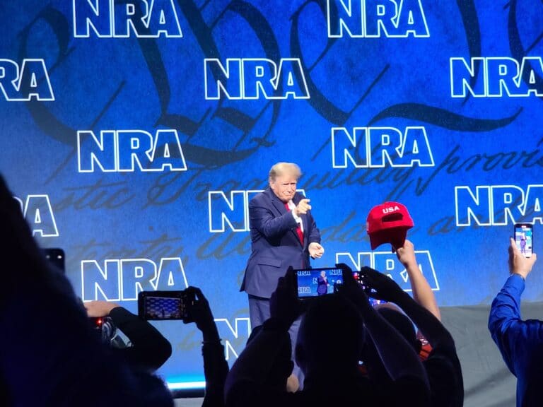 Donald Trump points to the crowd at the 2022 NRA Annual Meeting