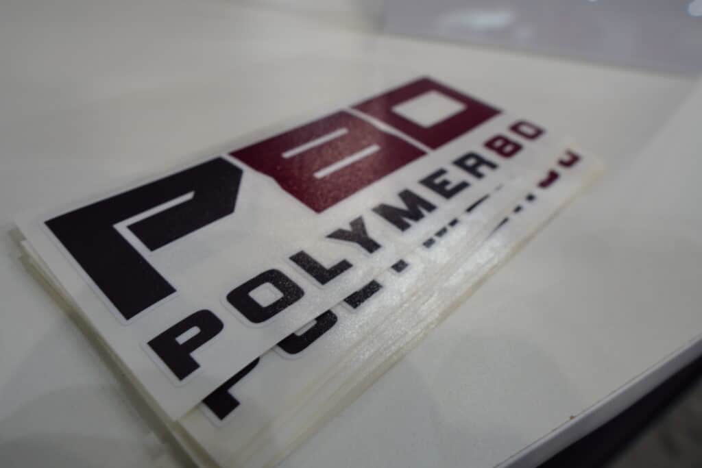 A stack of P 80 stickers at the 2022 NRA Annual Meeting