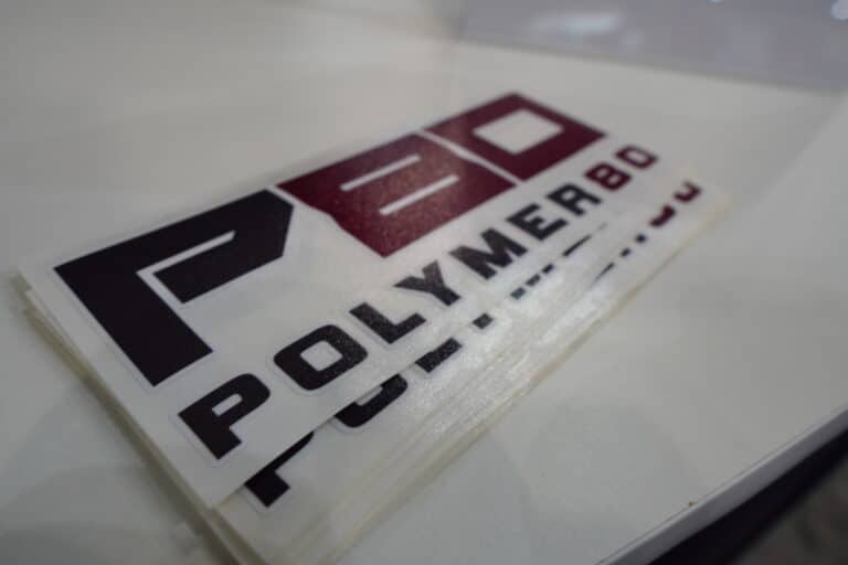 A stack of P 80 stickers at the 2022 NRA Annual Meeting