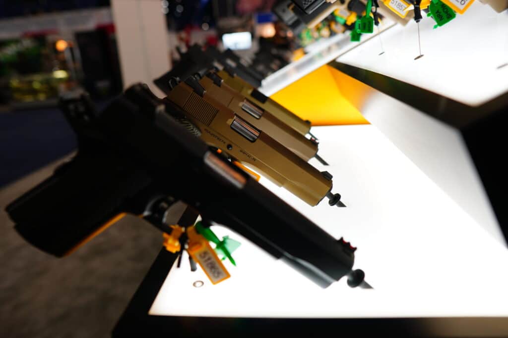 Several pistols displayed close up at the 2022 NRA Annual Meeting