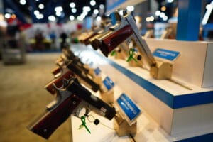 Various pistols displayed at the 2022 NRA Annual Meeting