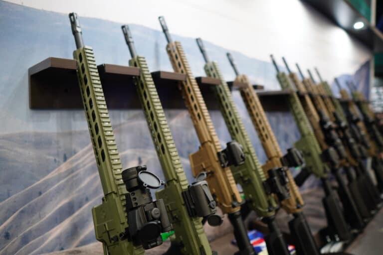 Rows of rifles on display at the 2022 NRA Annual Meeting