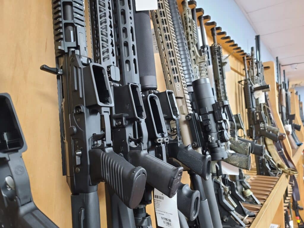 A rack of used rifles on sale at a gun store in Virginia