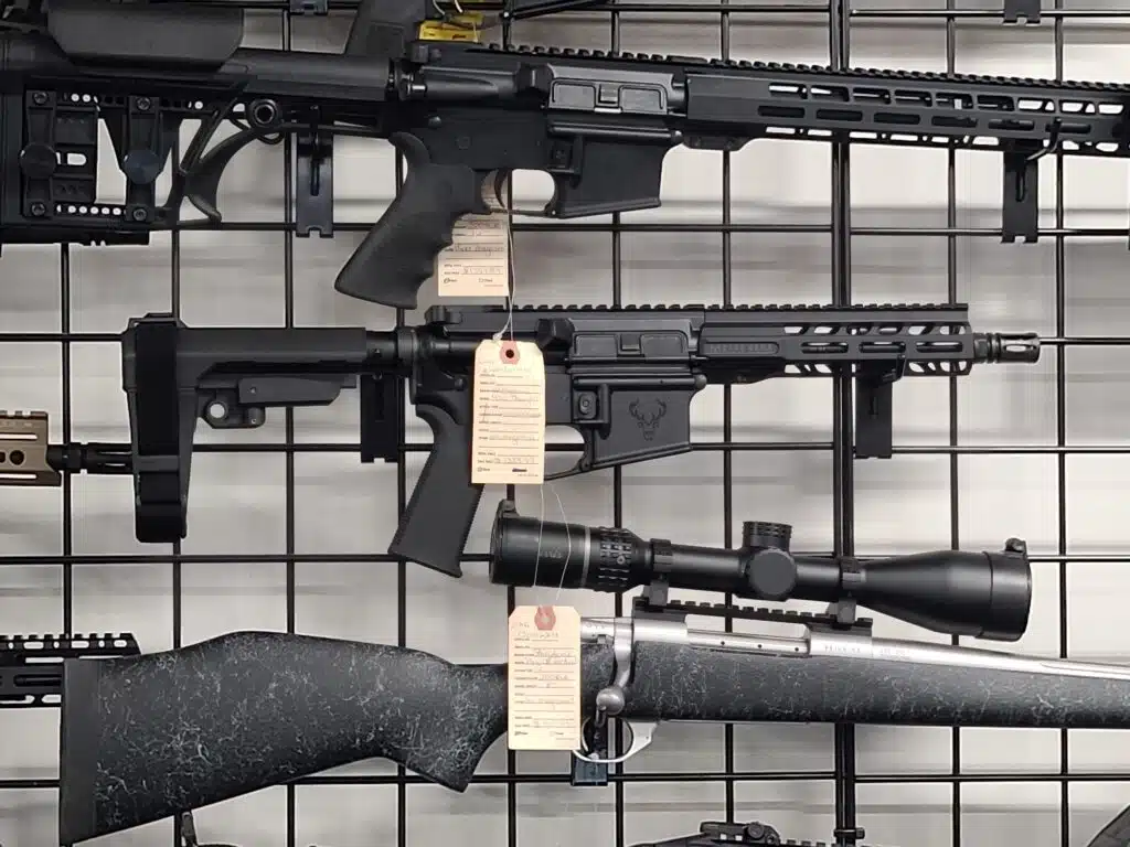 An AR-15 equipped with a pistol brace on sale at a gun shop