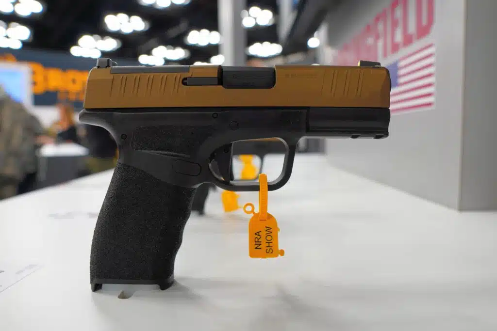 A pistol on display at the 2023 NRA Annual Meeting