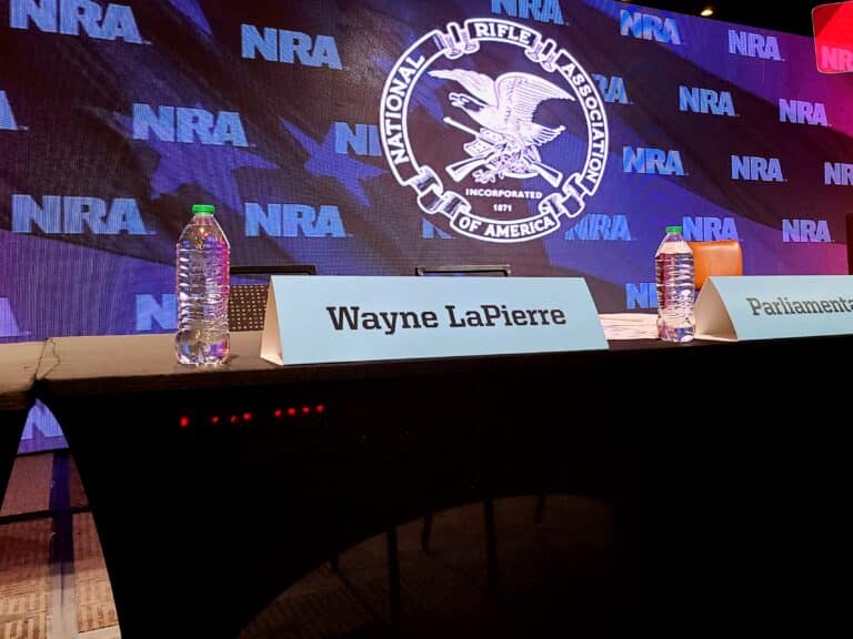 Wayne LaPierre's seat sits empty at an NRA board meeting in October 2021