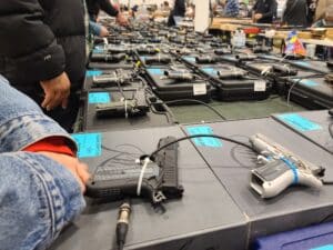 Customers examine pistols on sale at a 2023 Virginia gun show