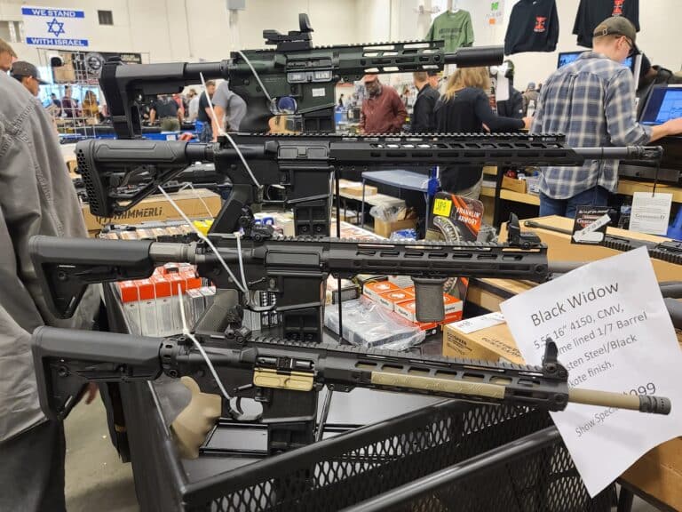 A collection of AR-15s on sale at a December 2023 gun show