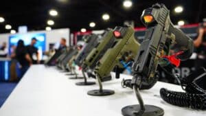 Pistols on display in the exhibit hall of the 2025 NRA Annual Meeting